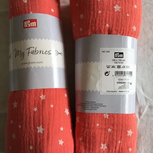 Coupon de tissu, coton, mousseline double gaze étoilée, couleur rouge saumon